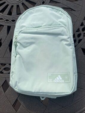 Adidas Essentials crossbody athletic sling bag.  NWOT